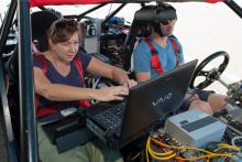 Photo of Lene with tester with electrodes on head