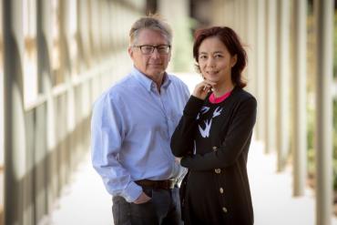 Photo of John Etchemendy and Fei-Fei Li, co-directors of the Stanford  Institute for Human-Centered Artificial Intelligence.