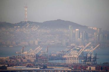 Sutro Tower rises above a low layer of smog hovering above San Francisco, Calif. on Tuesday, April 23, 2019. With dangerous air pollution on the rise in the Bay Area, author Sharon Chinthrajah makes a plug for a new Bay Area program to help low-income families buy electric cars.