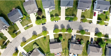 Aerial view of a subdivision street.
