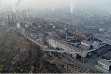 Aerial view of a coal-fired factory in Chengde, China, in 2018. Industrial emissions of carbon dioxide have returned close to pre-pandemic levels, according to new research. Surging consumption of coal and natural gas for power plants and industry is driving the rebound, especially in China. (Image credit: Shutterstock)