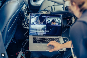 Stephanie Balters and Pablo Paredes test the mindful commute technology, with Paredes in the driver's seat. The test includes having seven cameras: four to observe the driver and three to capture the driving behavior. Sensors that are fitted on the driver records responses to specific stimulus.