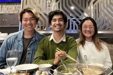 Celebratory team dinner for, (from left), Patrick Kim, Evan Baldonado and Lyna Kim, who took first place in the 2022 EnergyTech University Prize competition.