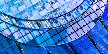 Different shades of blue silicon chips arranged in a circular pattern