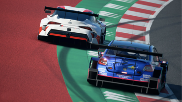 Photo of two race cars on race track. Photograph: Clive Rose/Gran Turismo/Getty Images