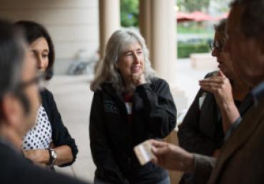 Photo of Stanford Law Professor, Deborah Sivas talking to students.