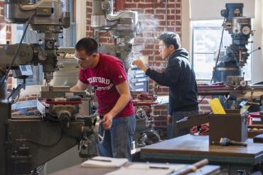 Photo of students working at the Stanford Product Realization Lab