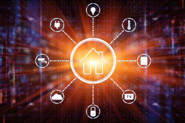 Graphic of a home in the center with bubbles showing a light bulb, thermometer, plug, TV, Lock, cloud, washing machine