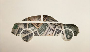 Graphic of car with dollar bills on it